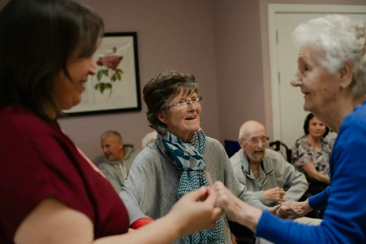 A busy, friendly social gathering in the lounge